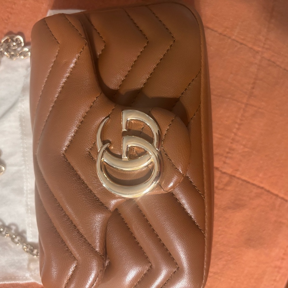 Luxurious Tan Quilted Mini Bag with Gold Accent